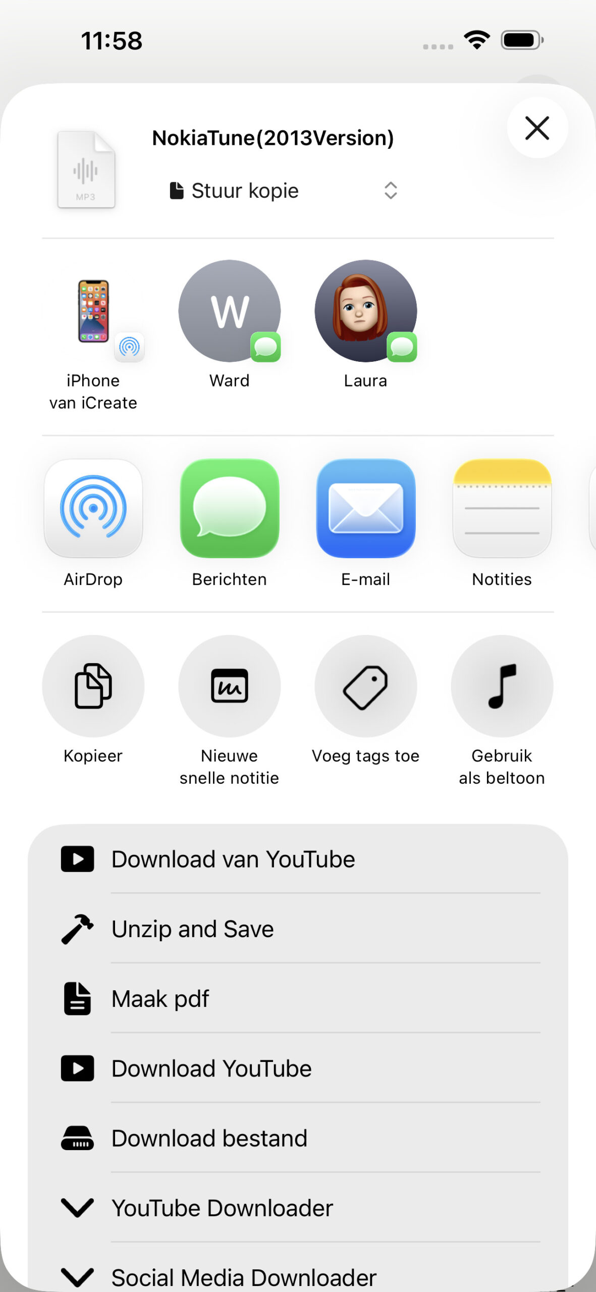 Instructiefoto: Of stel een eigen mp3 als beltoon in!