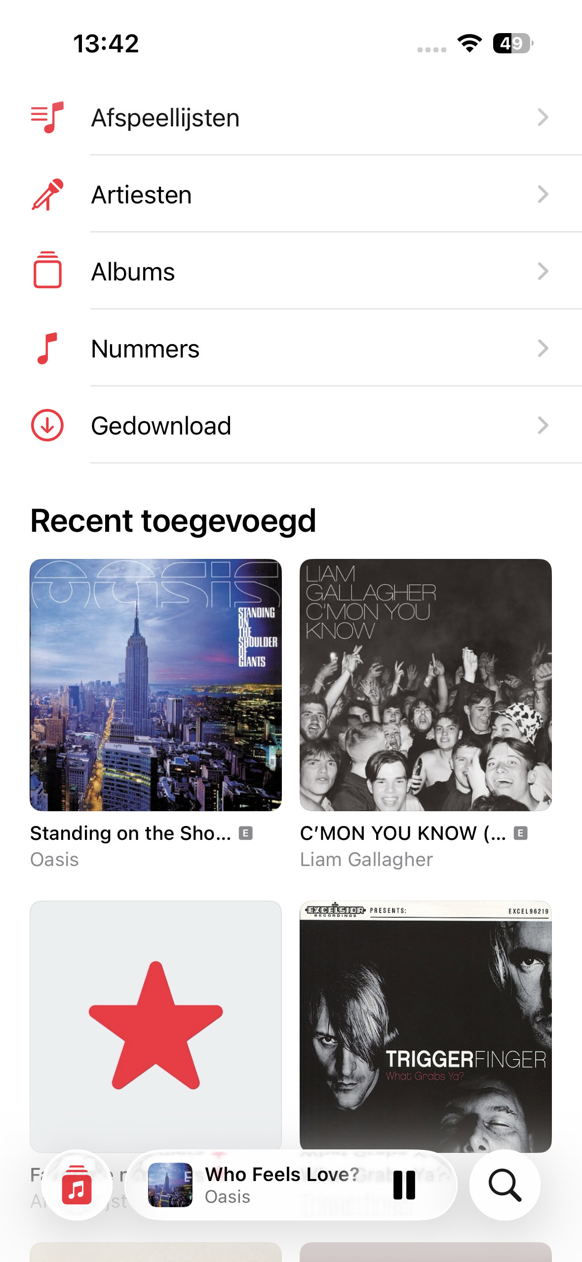 Instructiefoto: Pak de Muziek-app erbij