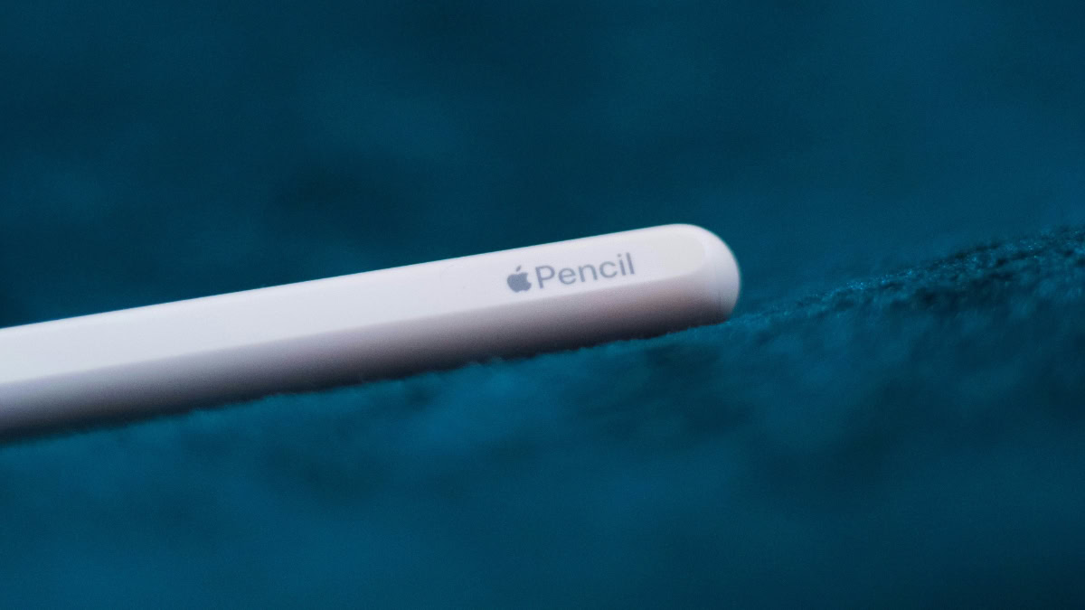 Uiteinde Apple Pencil op blauwe stof