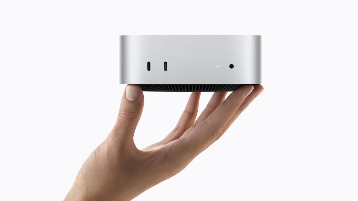 Mac mini 2026 bovenop hand