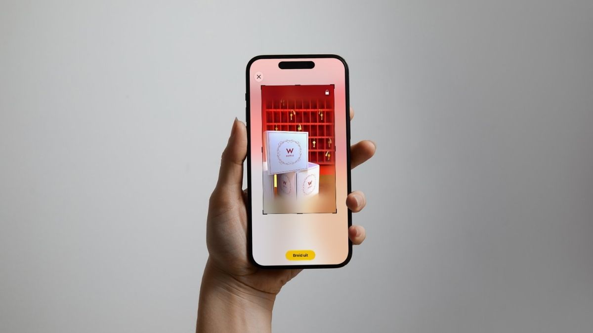 iPhone met 'Breid uit'-functie in hand
